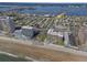 Aerial view of the property with easy access to restaurants, shopping, and the Intracoastal Waterway at 3267 S Peninsula Dr, Daytona Beach, FL 32118