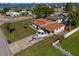 Aerial view of the property, featuring a well-maintained yard and boat parking at 3267 S Peninsula Dr, Daytona Beach, FL 32118
