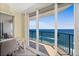 Balcony with ocean view, desk, and chair at 3315 S Atlantic Ave # 1406, Daytona Beach Shores, FL 32118