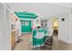 Modern kitchen design with bar stool seating and stainless steel appliances at 3315 S Atlantic Ave # 1406, Daytona Beach Shores, FL 32118