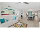 Bright living room showcasing the dining and kitchen area at 3315 S Atlantic Ave # 1406, Daytona Beach Shores, FL 32118
