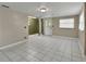 Large bonus room features tile flooring, and lots of natural light at 352 Harlan Ave, Lake Helen, FL 32744
