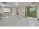 Large bonus room features tile flooring, and lots of natural light at 352 Harlan Ave, Lake Helen, FL 32744