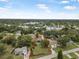 Aerial view of the property highlighting its proximity to local amenities, marked with a red property line at 37 Naranja Rd, Debary, FL 32713