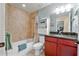 Well-lit bathroom featuring a shower-tub combo, granite countertop vanity, and complementing tile and paint at 37 Naranja Rd, Debary, FL 32713