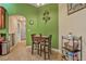 Charming breakfast nook featuring a small table with two chairs and decorative wall art at 37 Naranja Rd, Debary, FL 32713