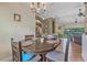 Spacious dining area with a large table, comfortable seating, and an open layout at 37 Naranja Rd, Debary, FL 32713