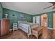 Inviting main bedroom with hardwood floors, lots of natural light and ensuite bathroom access at 37 Naranja Rd, Debary, FL 32713