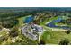 Aerial view of the community is near lakes and has a golf course at 438 Harbour Town Ln, Ormond Beach, FL 32174