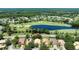 Beautiful aerial view of the home situated with golf course and pond views nearby at 438 Harbour Town Ln, Ormond Beach, FL 32174
