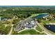 An aerial view of the community is near a golf course and lakes at 438 Harbour Town Ln, Ormond Beach, FL 32174