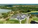 An aerial view of a community, golf course and lakes at 438 Harbour Town Ln, Ormond Beach, FL 32174
