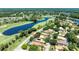 Stunning aerial view of the home in a golf course community with picturesque ponds and landscaping at 438 Harbour Town Ln, Ormond Beach, FL 32174