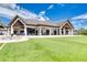 Inviting clubhouse patio with a cozy outdoor fire pit and comfortable seating area for relaxation at 438 Harbour Town Ln, Ormond Beach, FL 32174
