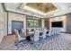 Modern conference room with a long table, ergonomic chairs, and contemporary lighting fixtures at 438 Harbour Town Ln, Ormond Beach, FL 32174