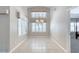 Dining room features two large windows and tile flooring at 438 Harbour Town Ln, Ormond Beach, FL 32174