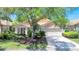Charming single-Gathering home with a well-maintained lawn, mature trees and an attached two car garage at 438 Harbour Town Ln, Ormond Beach, FL 32174