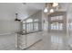 Kitchen island with sink and storage overlooking dining and living space at 438 Harbour Town Ln, Ormond Beach, FL 32174