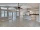 Bright open living space with high ceilings, tile floors, and access to the outdoors at 438 Harbour Town Ln, Ormond Beach, FL 32174
