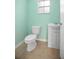Powder room featuring fresh paint, tile floor and a decorative vanity sink at 45 S University Cir, Deland, FL 32724