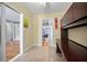 Bright home office with tiled flooring, decorative paintings, and built-in desk at 45 S University Cir, Deland, FL 32724