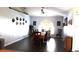 Formal dining room featuring wood floors, ample space for entertaining, and natural light at 4611 Se 32Nd Pl, Ocala, FL 34480