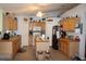 Bright kitchen with wood cabinets, island, appliances, and plenty of counter space at 4611 Se 32Nd Pl, Ocala, FL 34480