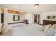 This bedroom showcases wood accents, white pillars, a ceiling fan, and tile floors at 5366 N Lake Farms Rd, De Leon Springs, FL 32130