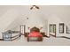 Cozy bedroom with high ceilings, a sleigh bed, and ample natural light from the windows at 5366 N Lake Farms Rd, De Leon Springs, FL 32130