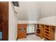 Walk-in closet with custom wood shelves and drawers for storage at 5366 N Lake Farms Rd, De Leon Springs, FL 32130