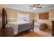 Bedroom featuring two beds, ceiling fan, large window and parquet floors at 558 Tulane Dr, Altamonte Springs, FL 32714
