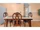 Dining area with tiled floors and seating for four at 558 Tulane Dr, Altamonte Springs, FL 32714