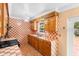 Kitchen featuring wood cabinets and tile backsplash at 558 Tulane Dr, Altamonte Springs, FL 32714