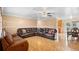 Living room featuring leather furniture and tile flooring at 558 Tulane Dr, Altamonte Springs, FL 32714