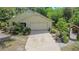 Charming single-story home with lush landscaping at 5635 Burts Park Rd, De Leon Springs, FL 32130