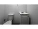 Tight bathroom featuring white sink and toilet at 601 Berkshire Rd, Daytona Beach, FL 32114