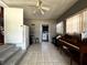 Spacious laundry room area with tile floors and modern appliances, including a washer and dryer at 601 Berkshire Rd, Daytona Beach, FL 32114