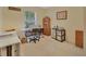 Comfortable bedroom with a desk and natural light at 663 E Lansdowne Ave, Orange City, FL 32763