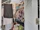 Walk-in closet providing ample storage space with clothing racks and shelves at 663 E Lansdowne Ave, Orange City, FL 32763