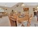 Cozy dining area with a view into the living room and kitchen, making it ideal for entertaining at 663 E Lansdowne Ave, Orange City, FL 32763