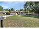 Traditional single-story home boasting a well-manicured lawn and attached two car garage at 663 E Lansdowne Ave, Orange City, FL 32763