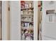 Walk-in pantry featuring ample shelved storage at 663 E Lansdowne Ave, Orange City, FL 32763