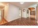 Hallway featuring hardwood flooring and natural light at 712 S Timberlane Dr, New Smyrna Beach, FL 32168