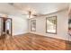 Inviting living room featuring natural light, hardwood floors, and an entryway with glass french doors at 712 S Timberlane Dr, New Smyrna Beach, FL 32168
