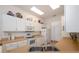 Bright kitchen showcasing white cabinets and modern appliances at 723 Oakwater Ln, Port Orange, FL 32128