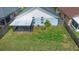 Aerial view of backyard featuring lawn, patio, and perimeter fence at 809 Brightview Dr, Lake Mary, FL 32746