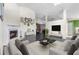 Bright living room with fireplace, modern furnishings, and open floor plan at 809 Brightview Dr, Lake Mary, FL 32746