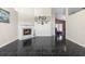 Spacious living room with marble fireplace and dark tile flooring at 809 Brightview Dr, Lake Mary, FL 32746