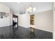 Open-concept living room with vaulted ceiling and access to kitchen at 809 Brightview Dr, Lake Mary, FL 32746