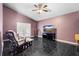 Sitting room features tile floor, ceiling fan, and sliding glass door leading outdoors at 809 Brightview Dr, Lake Mary, FL 32746
